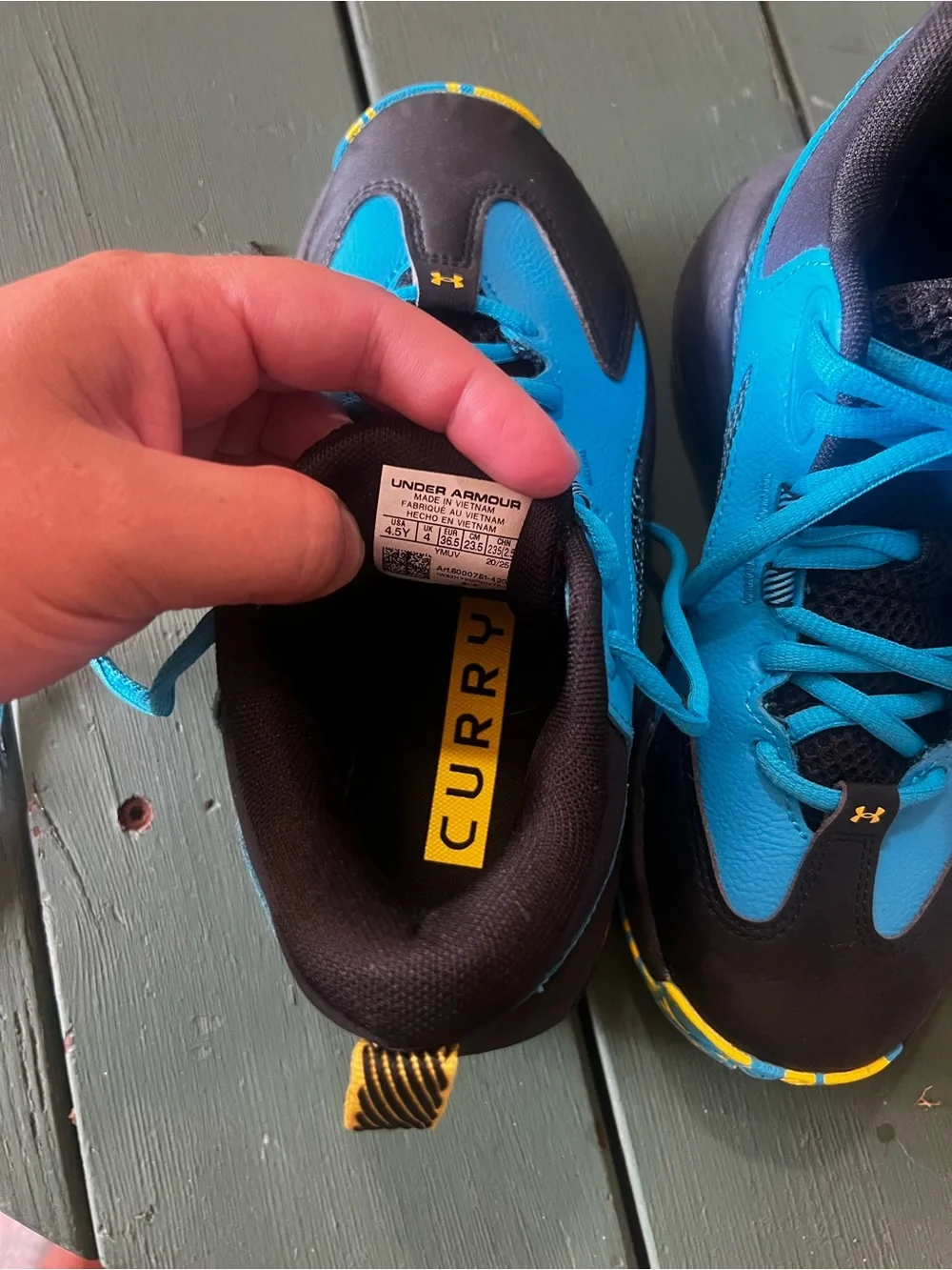 Under Armour Kids Blue and Black Athletic Sneakers with Yellow Accents
